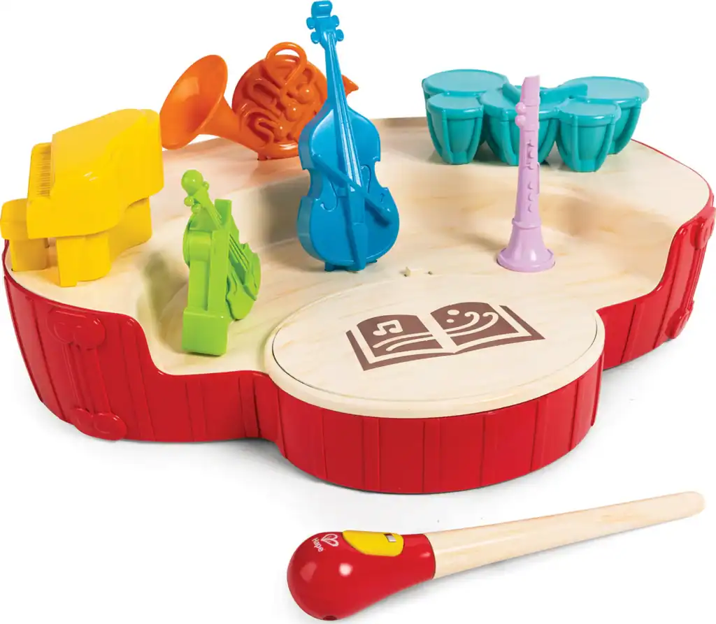 Colorful toy musical instruments on a wooden base.