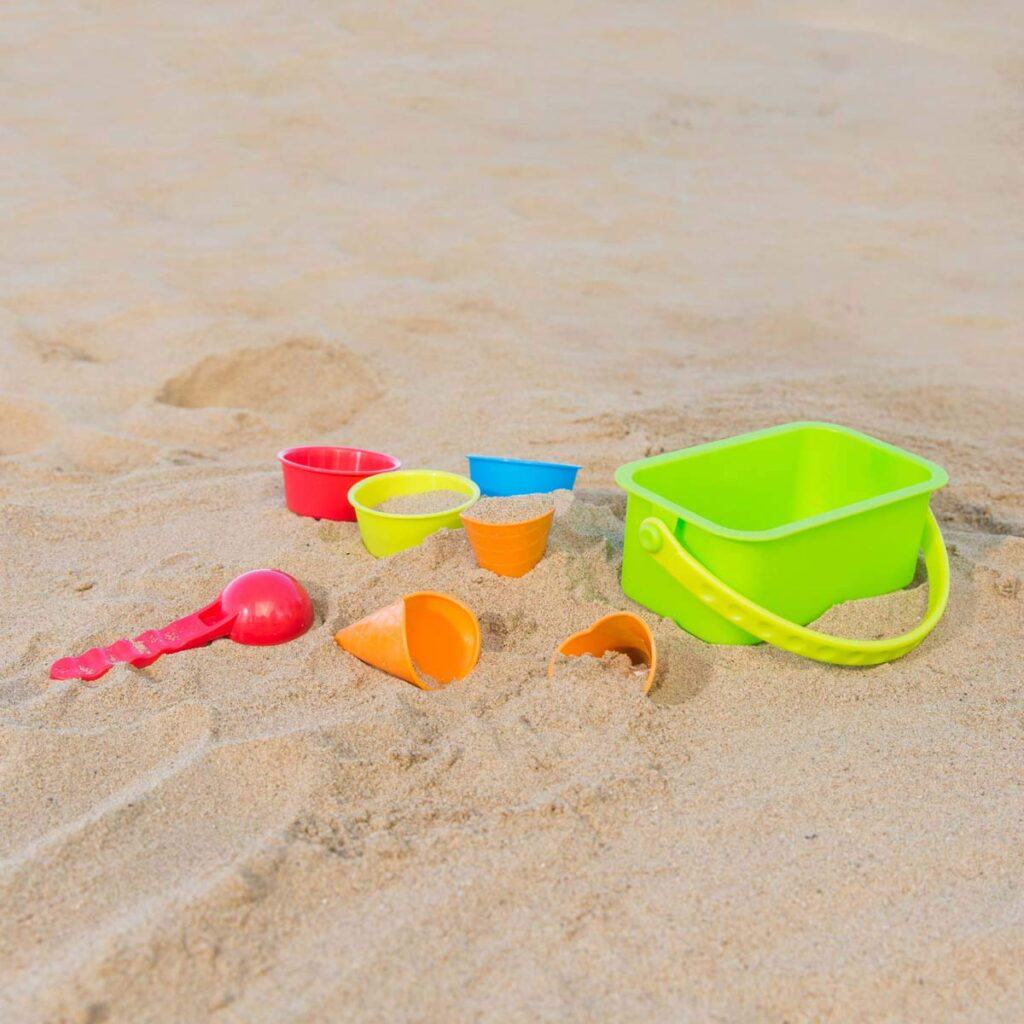 Colorful sand toys on the beach
