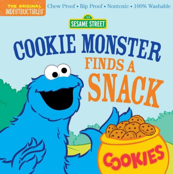 Cookie Monster holding cookies, book cover image.