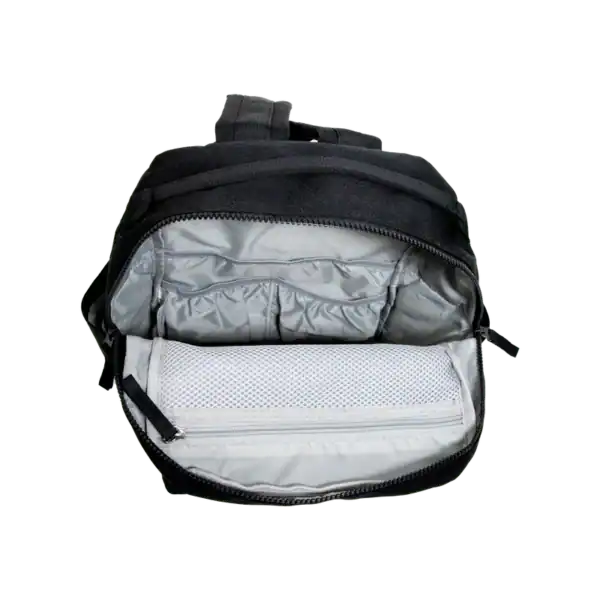 Open backpack showing compartments and zippers.