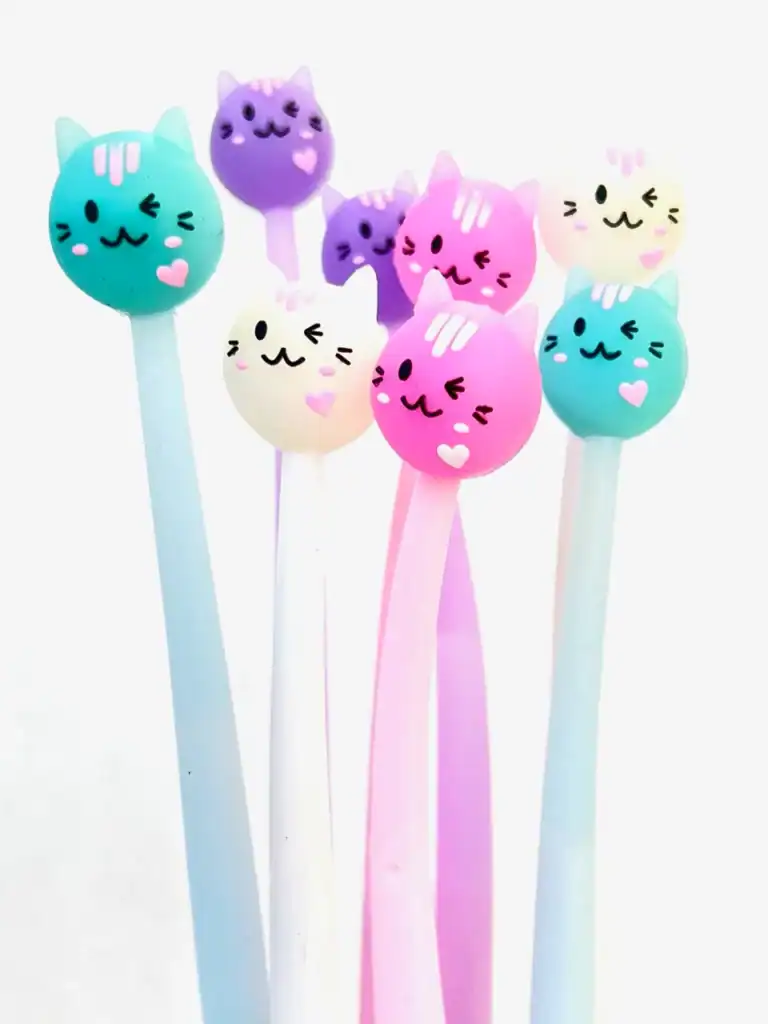 Colorful cute cat face pens with pastel colors.