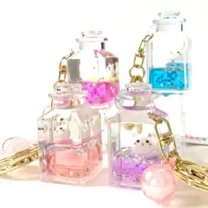Cute animal keychains in colorful jars with stars.