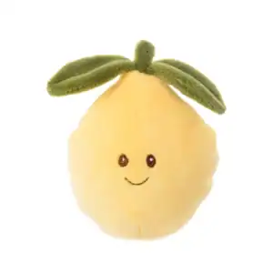Smiling lemon plush toy with green leaves.