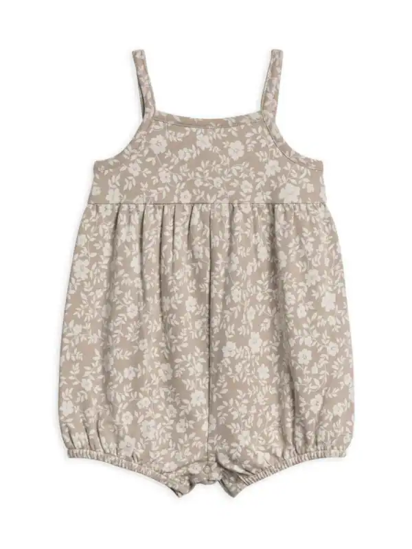 Beige floral baby romper with straps.