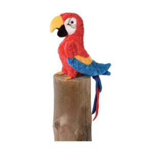 Colorful plush parrot on wooden post