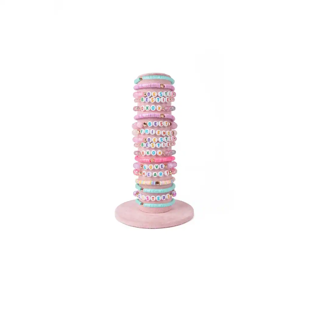 Colorful word bead bracelets on pink stand