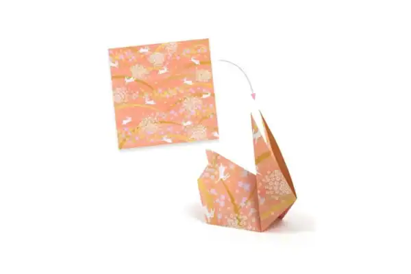 Origami paper folding to rabbit shape.