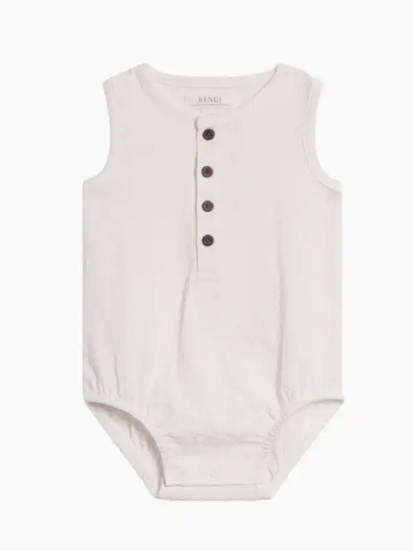 White sleeveless baby bodysuit with buttons.