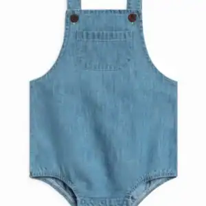 Blue denim baby romper with buttons front view.