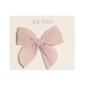 Pink lace bow on Kendi card