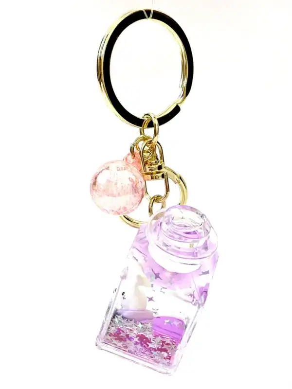 Purple rabbit keychain with pink charm