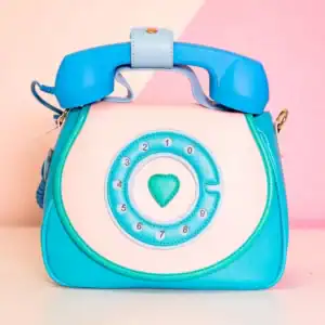 Retro phone-shaped handbag with blue accents.
