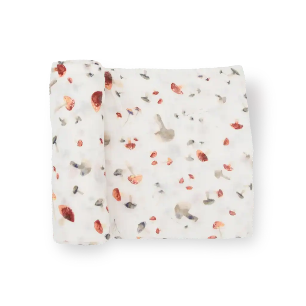 White cloth with colorful mushroom pattern