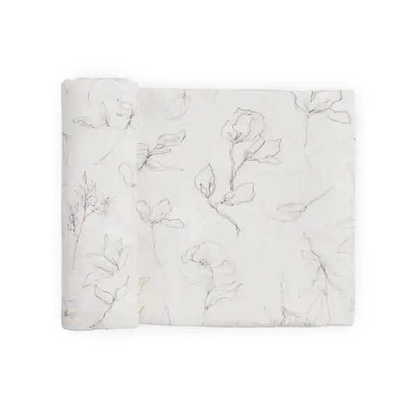 White fabric with floral pattern design.