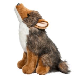 Plush coyote toy sitting and howling.