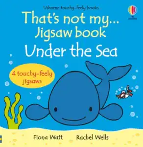Children's jigsaw book cover with whale illustration.
