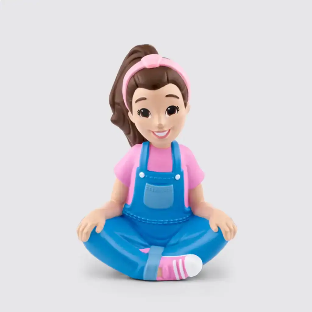 Smiling girl figurine in blue overalls.
