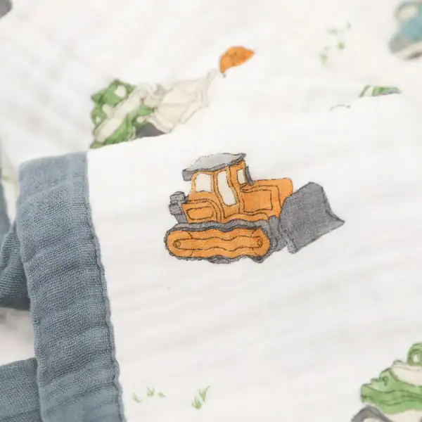 Baby blanket with colorful construction vehicles