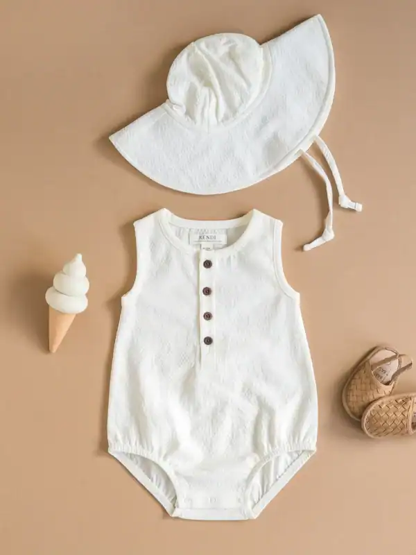 Baby romper with hat, shoes, and toy ice cream.