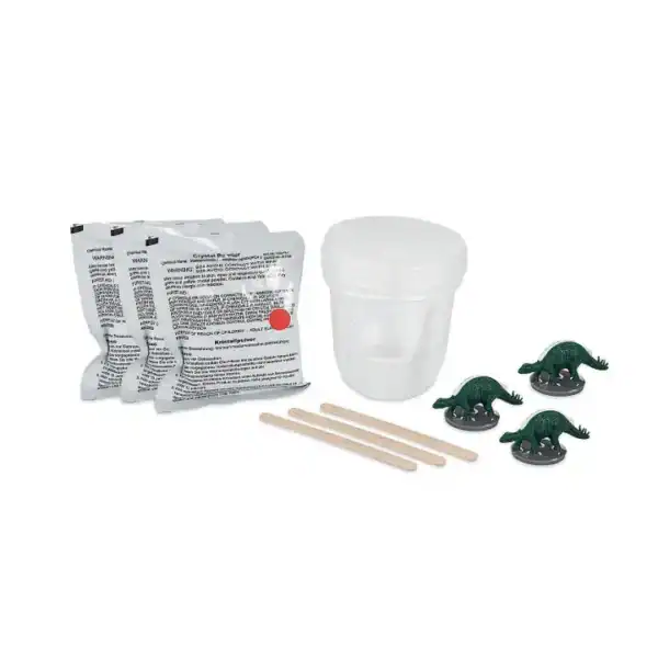Dinosaur crystal growing kit with materials and figures.