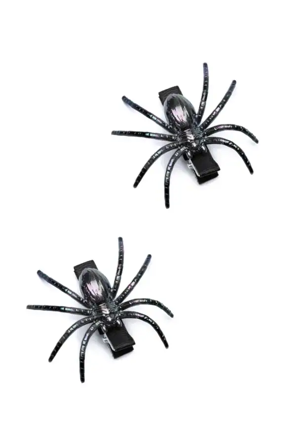 Two black spider hair clips on white background.