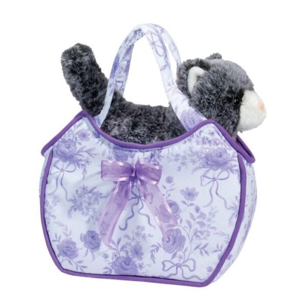 Stuffed cat in floral purple bag with bow.