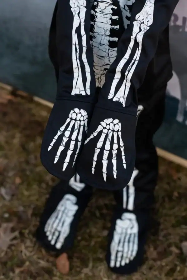 Skeleton costume with bone graphics outdoors