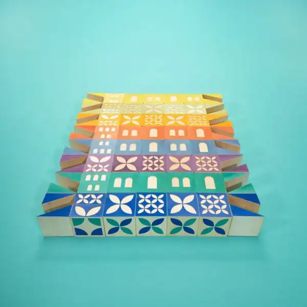 Colorful patterned blocks on turquoise background