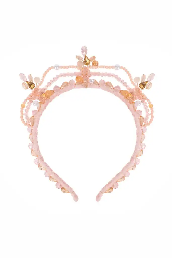 Pink ornate beaded crown with gold accents.