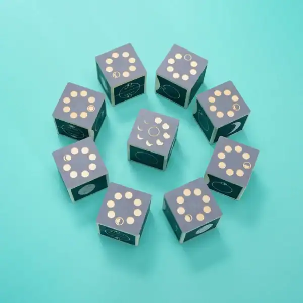 Wooden moon phase blocks in circular arrangement.