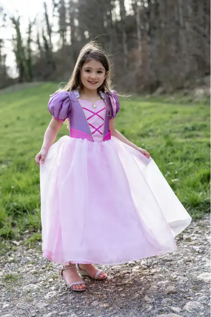 Girl in pink princess dress outdoors