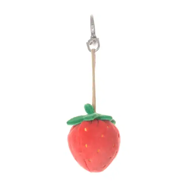 Plush strawberry keychain with green leaves.