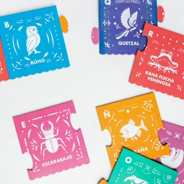 Colorful Spanish alphabet animal cards on white background.