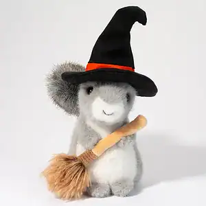 Plush squirrel in witch hat with broomstick.