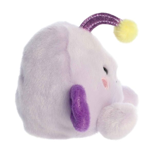 Plush purple elephant toy with glitter trunk.