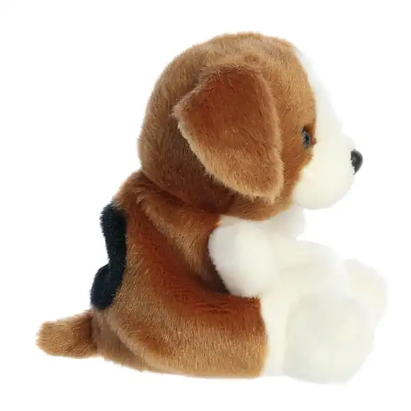 Brown and white plush puppy toy sitting