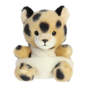 Spotted plush toy cat with black and white patches.