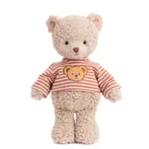 Plush teddy bear with striped sweater.