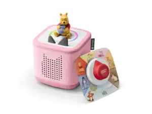 Pink audio box with bear figure on top.