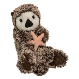 Plush otter holding pink starfish toy.