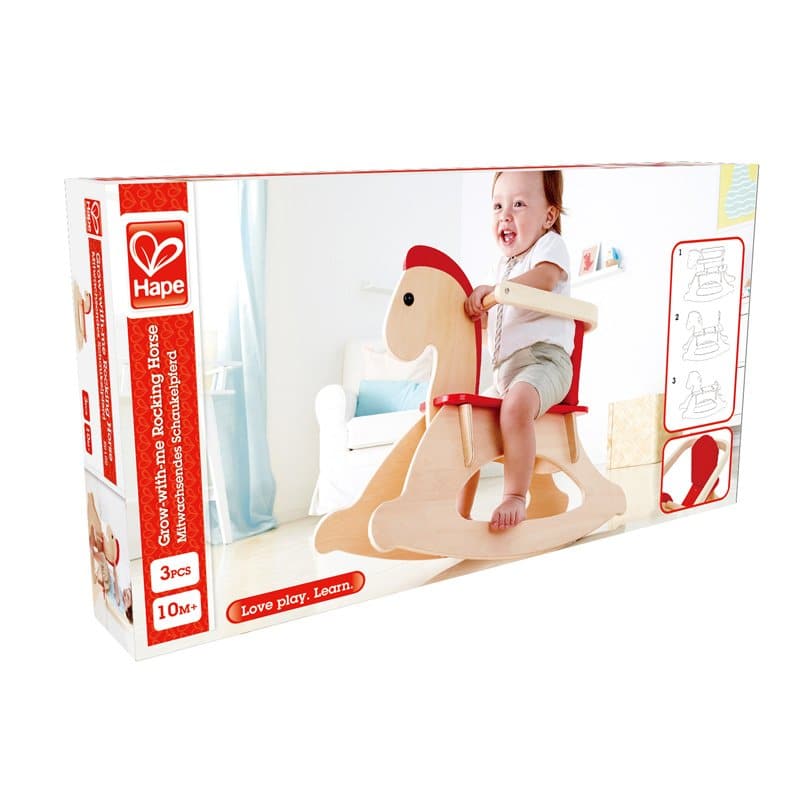 Toddler riding wooden rocking horse toy