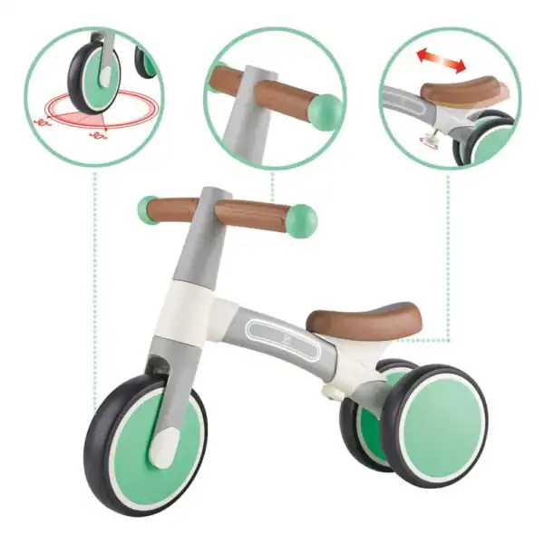 Green toddler balance bike with adjustable seat