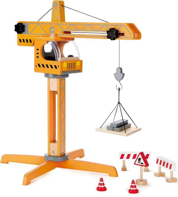 Wooden toy crane with construction accessories.