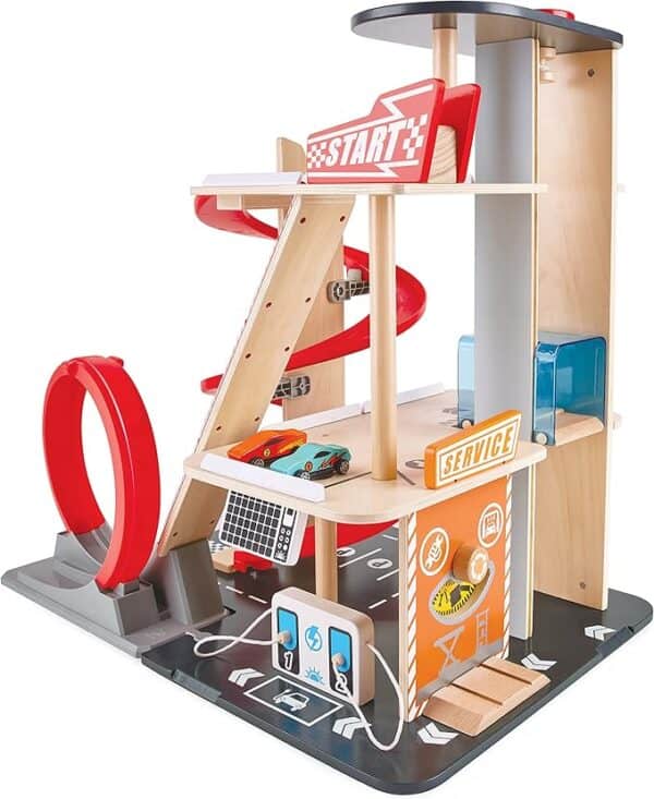 Wooden toy car garage with play cars and ramp.