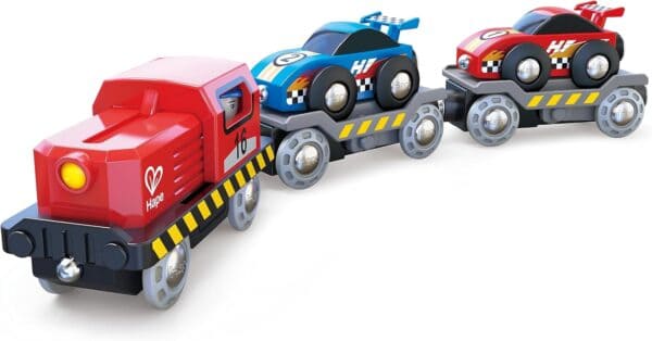 Colorful toy train with racing cars on trailers.