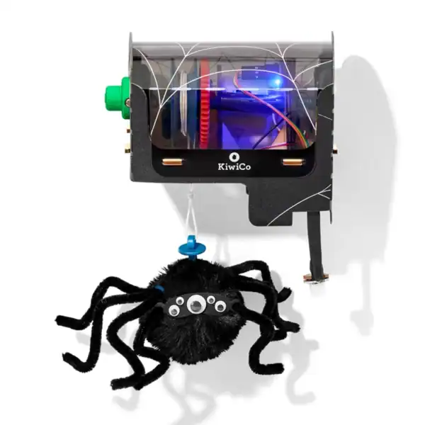 KiwiCo mechanical spider kit hanging from box