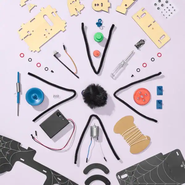 Assorted robot parts on a light background.