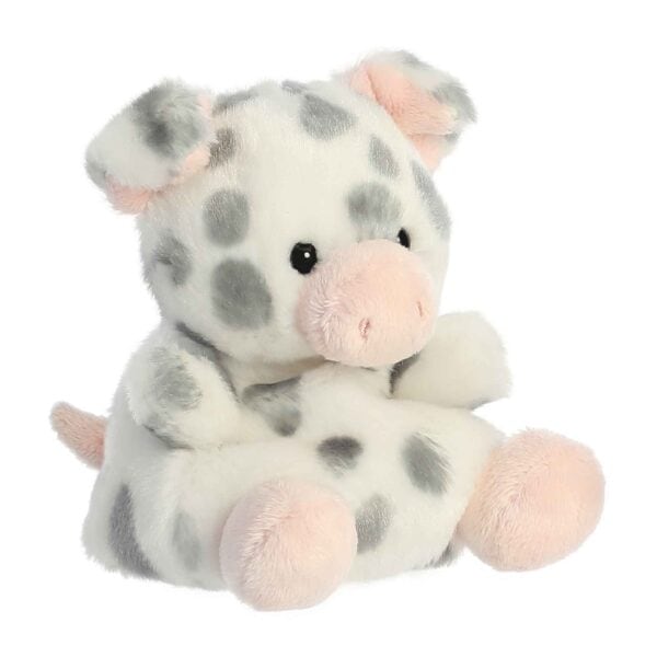 Plush pig toy with gray spots and pink ears.