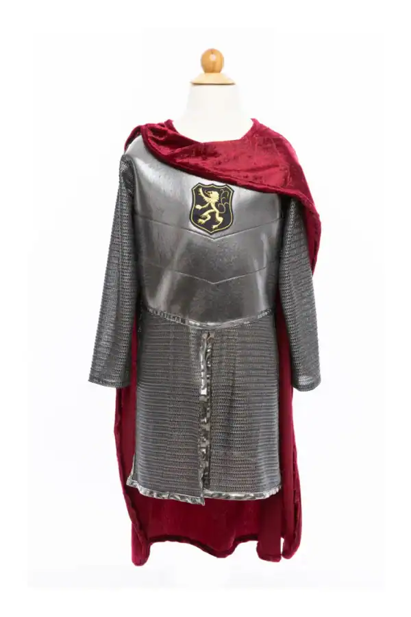 Child's knight costume with red cape and emblem.