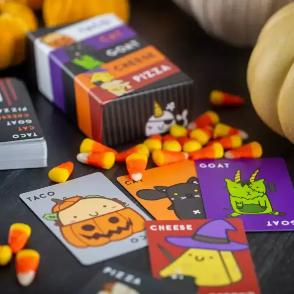 Halloween-themed card game with candy corn and pumpkins.